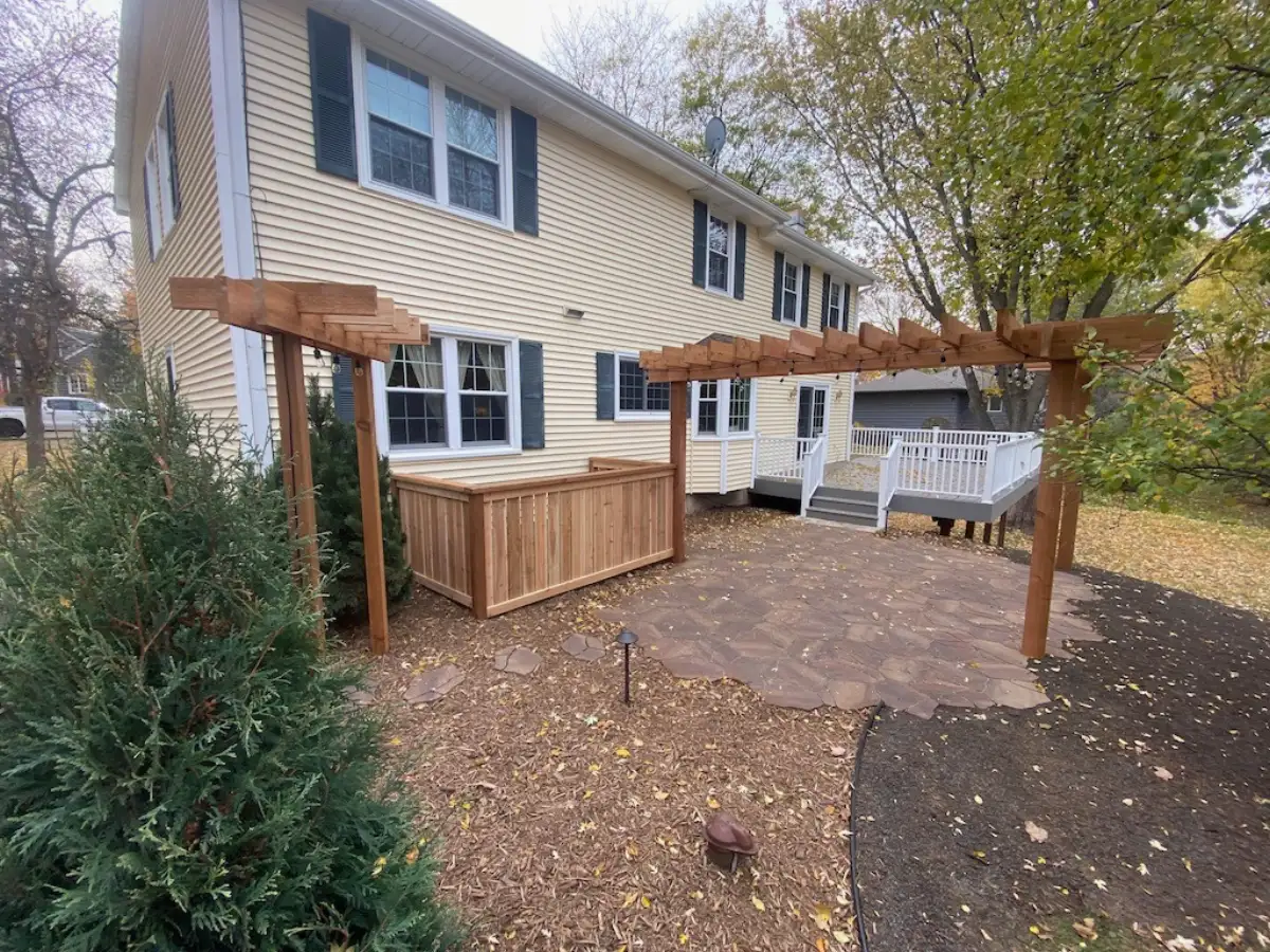 Deephaven outdoor living oasis after transformation by Landscape Charlie