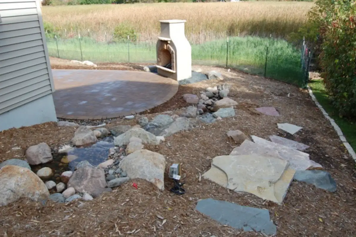 Plymouth backyard after outdoor living project by Landscape Charlie