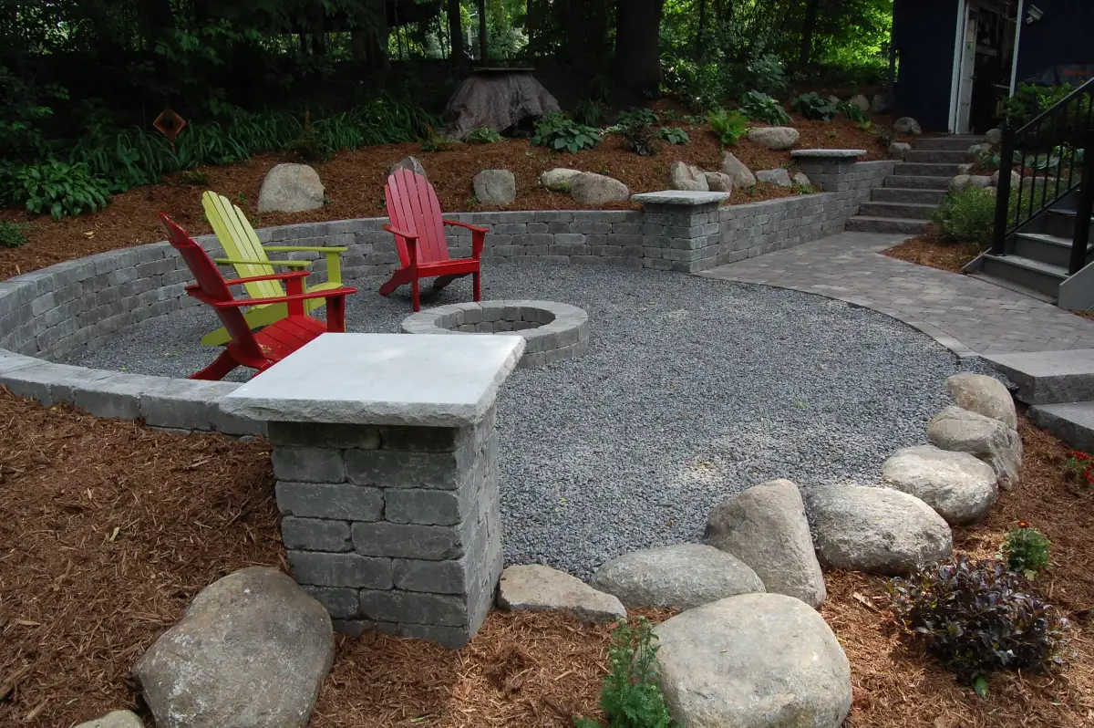 Custom stone fire pit with seating area in Shorewood MN
