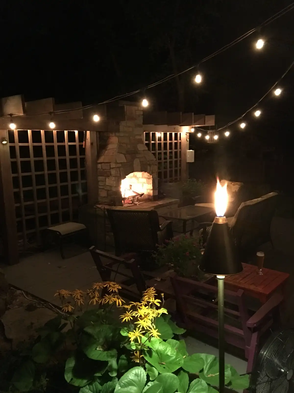 Rectangular fire table integrated into outdoor living area