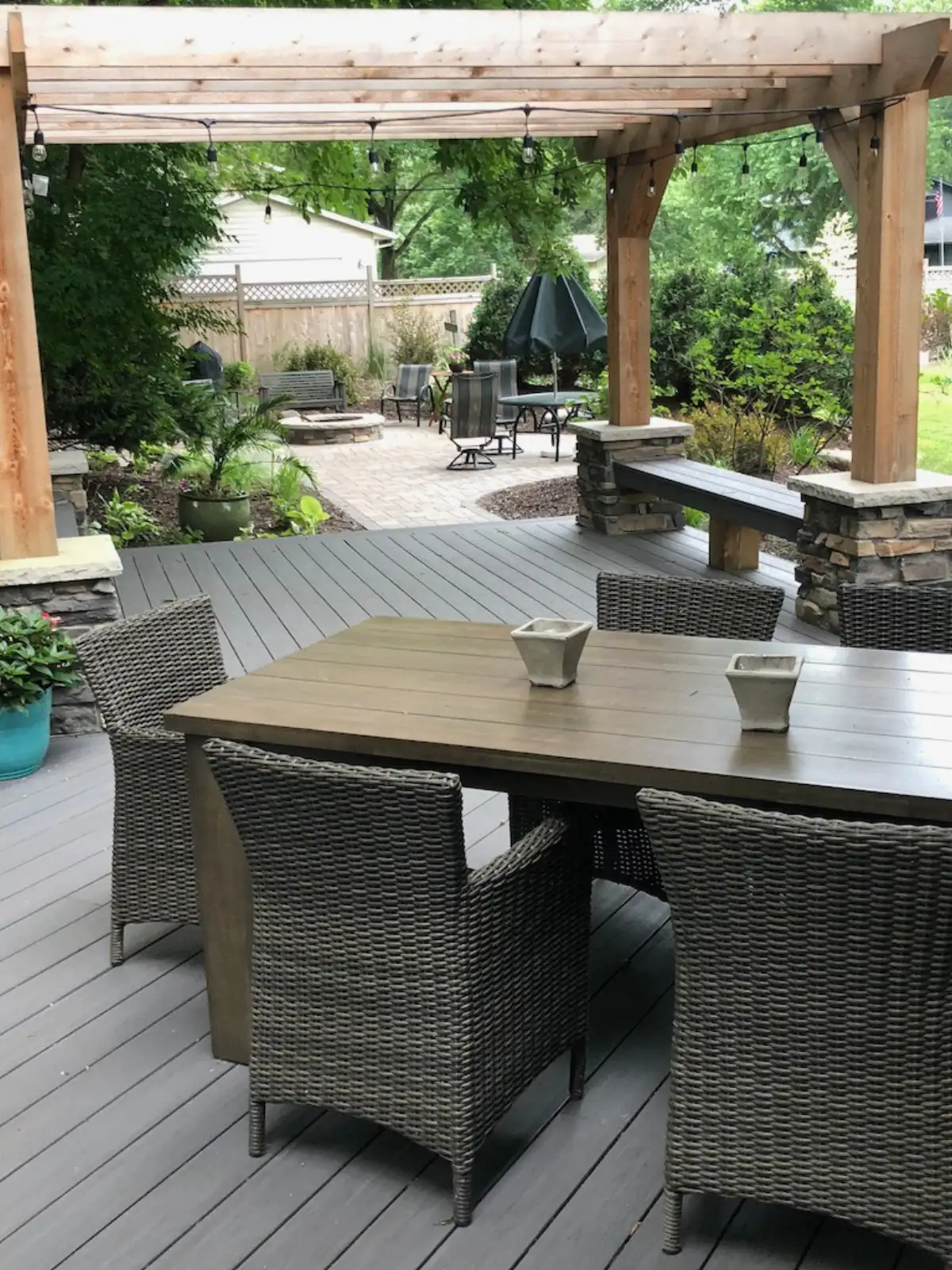 Complete backyard transformation with patio, walls, and lighting in Eden Prairie