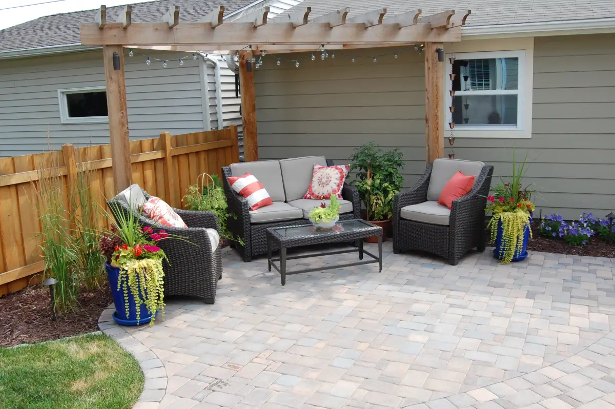 Lakeside outdoor living area with deck and patio near Wayzata
