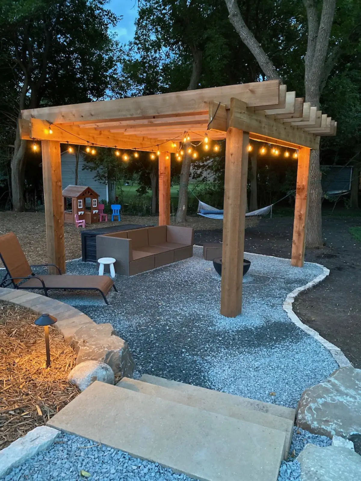 Modern pergola structure over outdoor seating