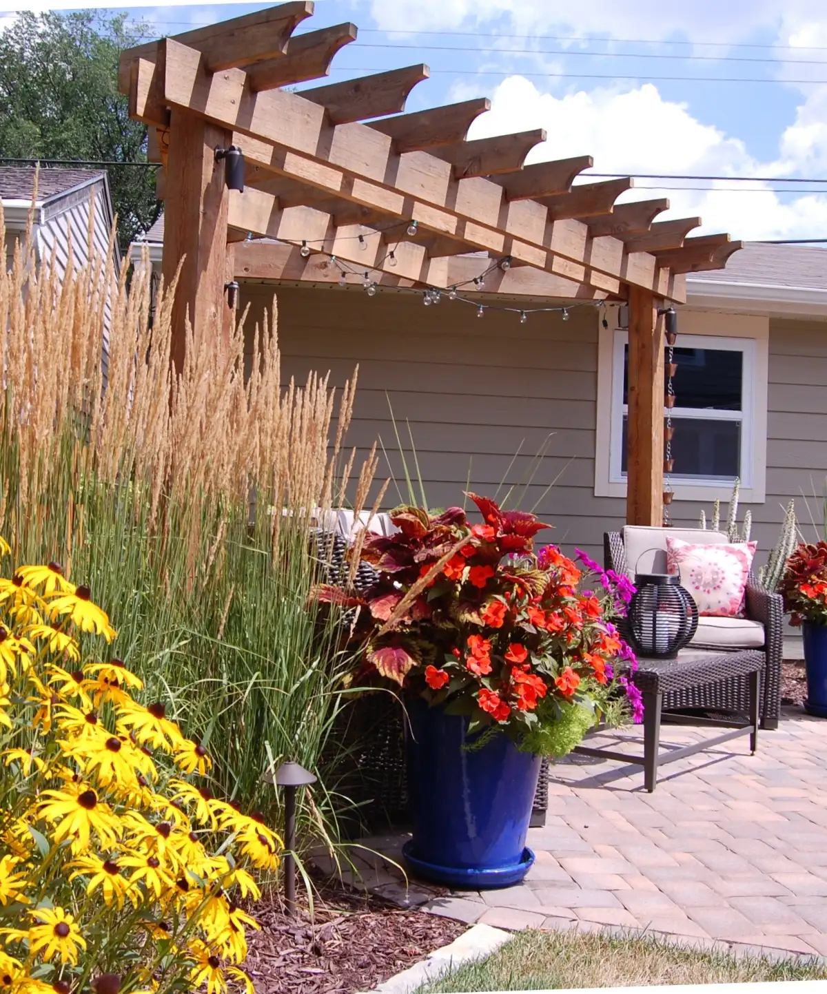 Cedar pergola with outdoor kitchen area in Minnetonka MN