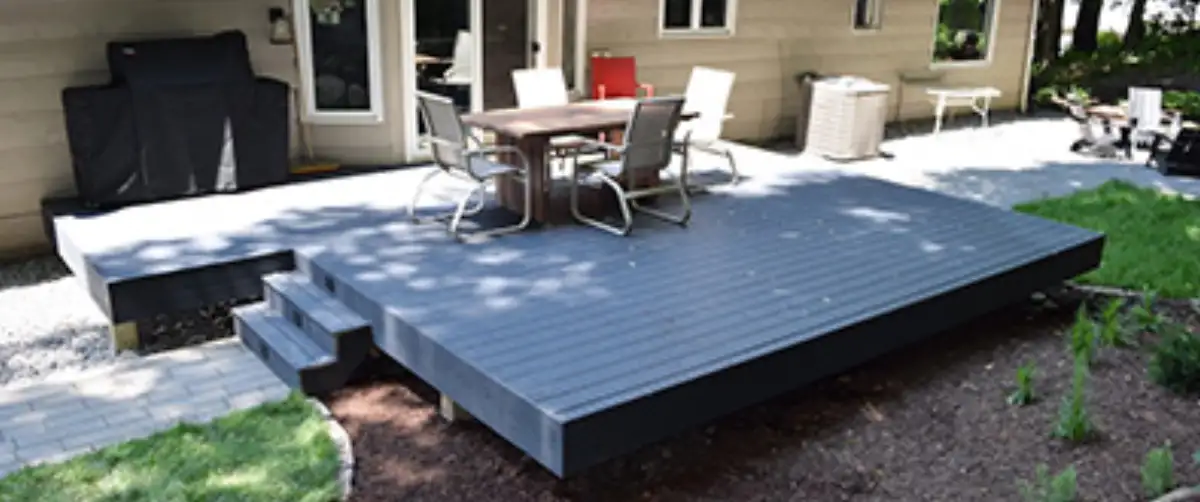 Composite deck with built-in seating overlooking Lake Minnetonka