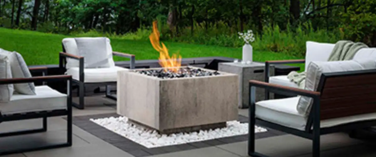 Custom fire pit and outdoor fireplace in Chanhassen backyard
