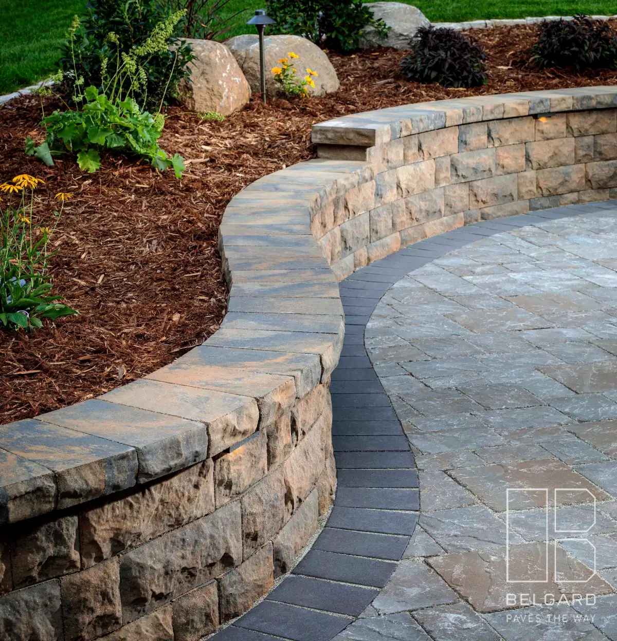 Curved retaining wall with terraced garden beds